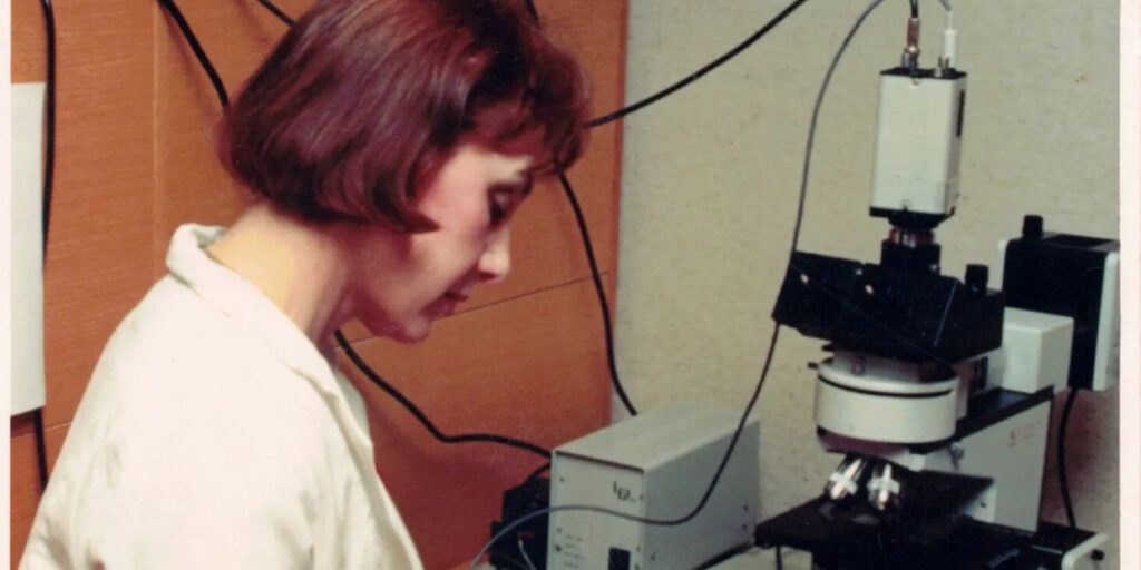 linda robertson at a microscope