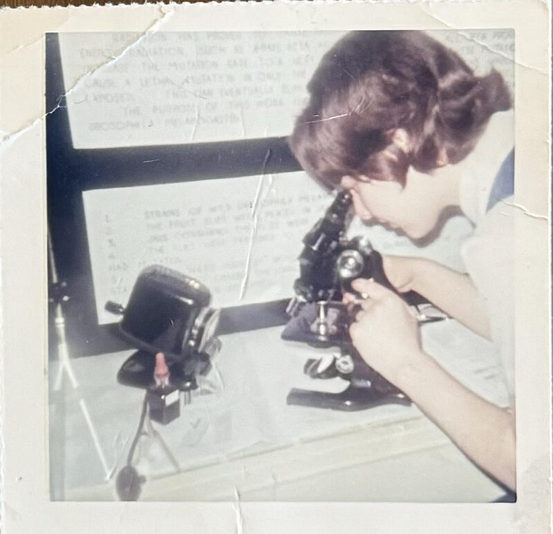 Linda Robertson using microscope for school project