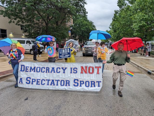 Democracy is not a Spectator Sport at parade